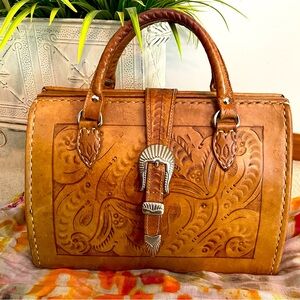 Hand tooled leather handbag